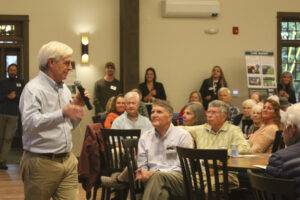 speaker addresses a crowd