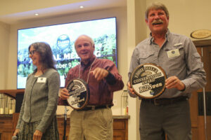 two people receive awards